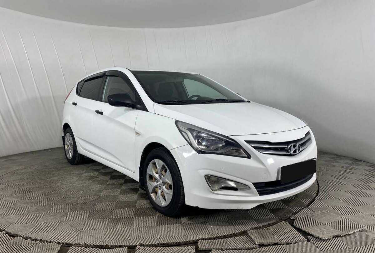 Hyundai Solaris с пробегом — 2014 год. Фото: #2