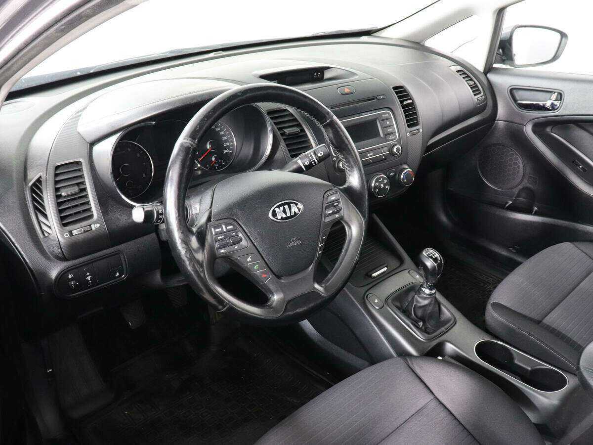 Kia Cerato с пробегом — 2014 год. Фото: #7