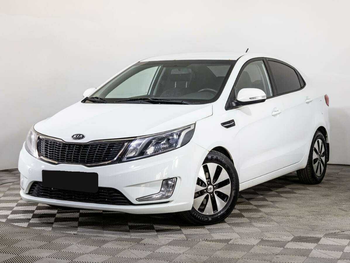 Kia Rio с пробегом — 2012 год. Фото: #0