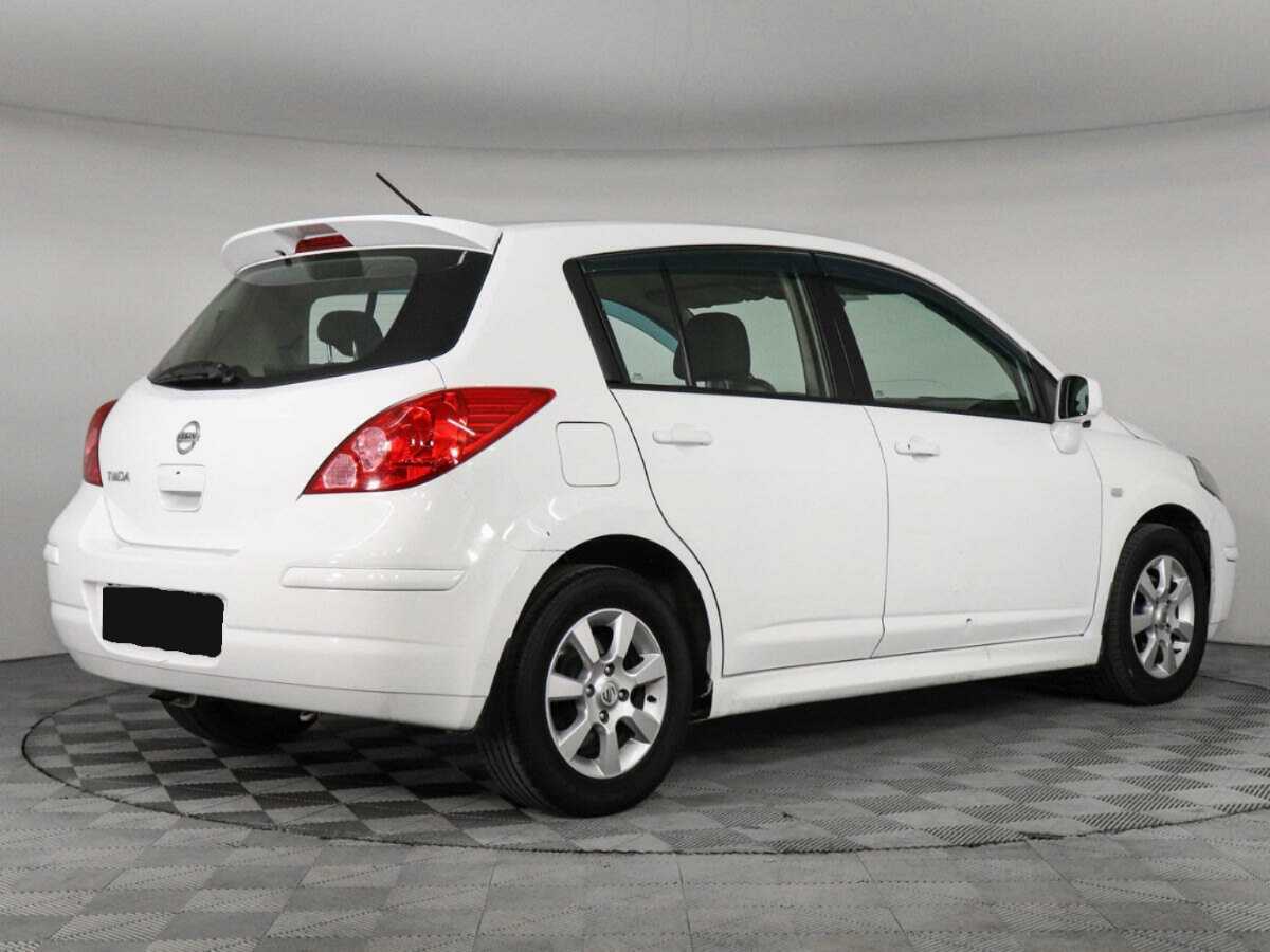 Nissan Tiida с пробегом — 2013 год. Фото: #4